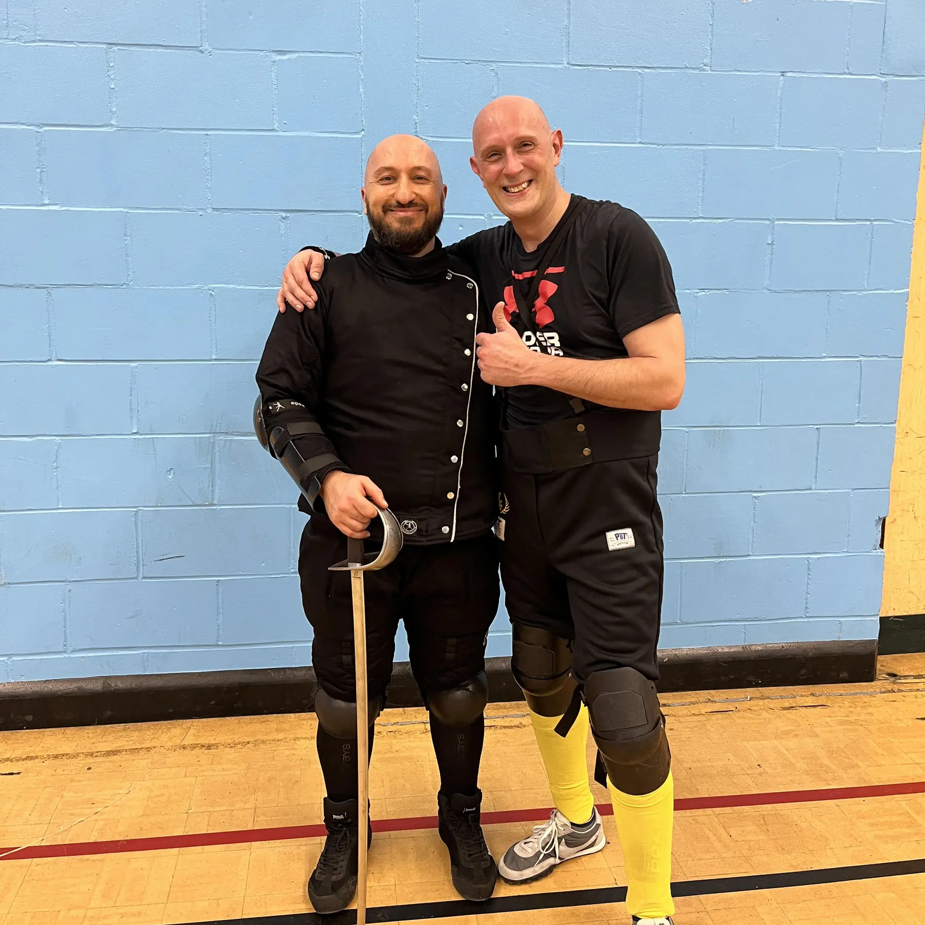 Olgun learning military sabre from Matt Easton HEMA instructor - Schola Gladiatoria Olgun learning military sabre from Matt Easton HEMA instructor - Schola Gladiatoria